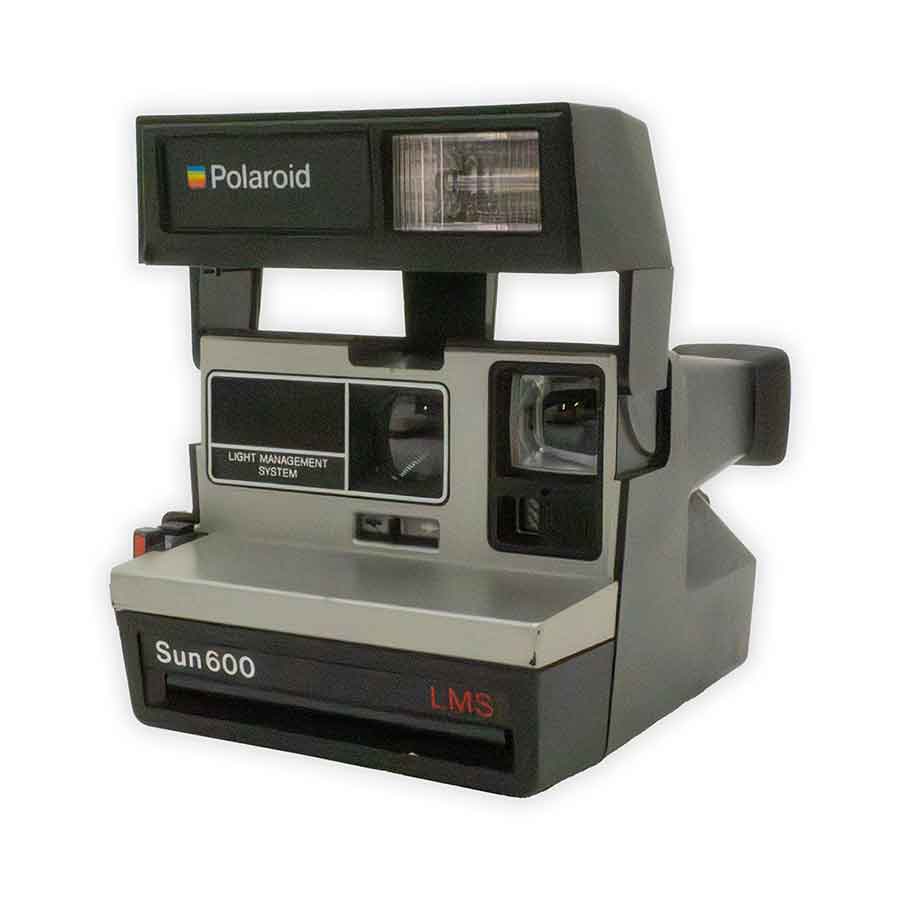 Vintage Polaroid Sun 600 camera on a white background