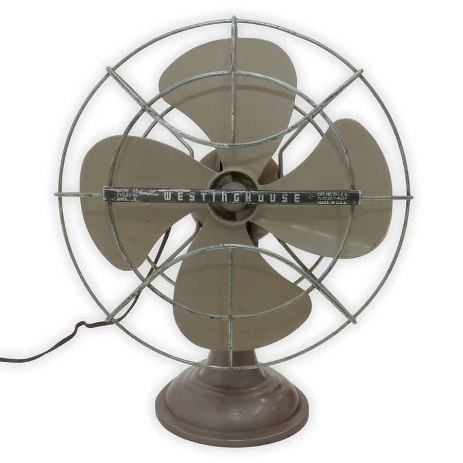 Vintage Westinghouse fan on a white background