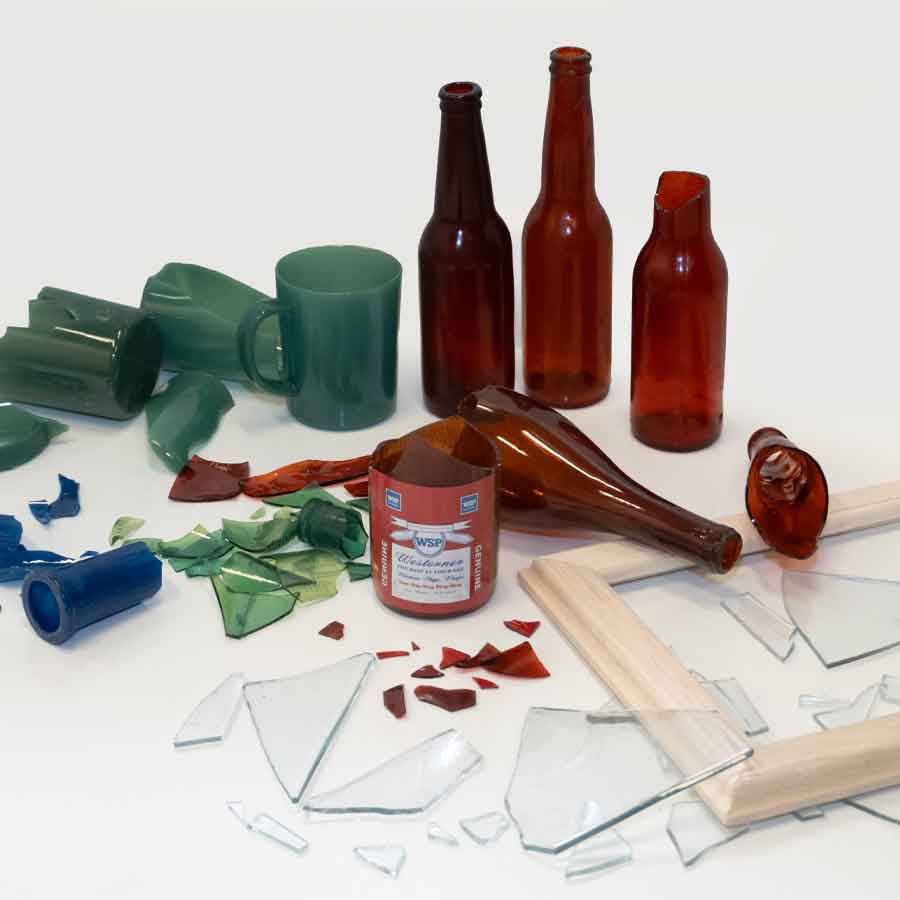 Broken and whole breakaway glass bottles and picture frame - category image. 