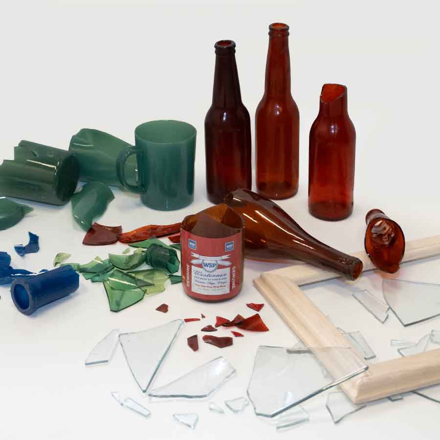 Broken and whole breakaway glass bottles and picture frame - category image.
