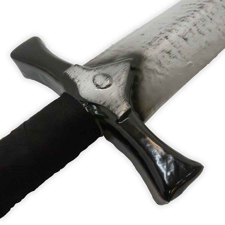 Sword with black handle and textured blade on a white background