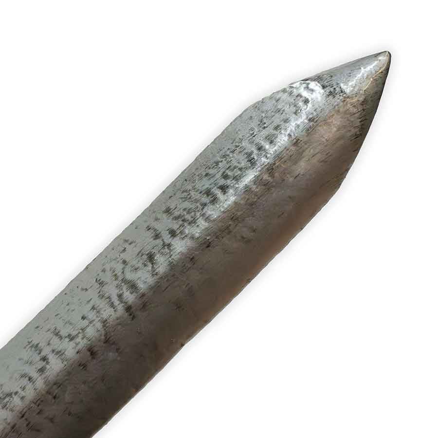 Close-up of a metallic spear tip on a white background