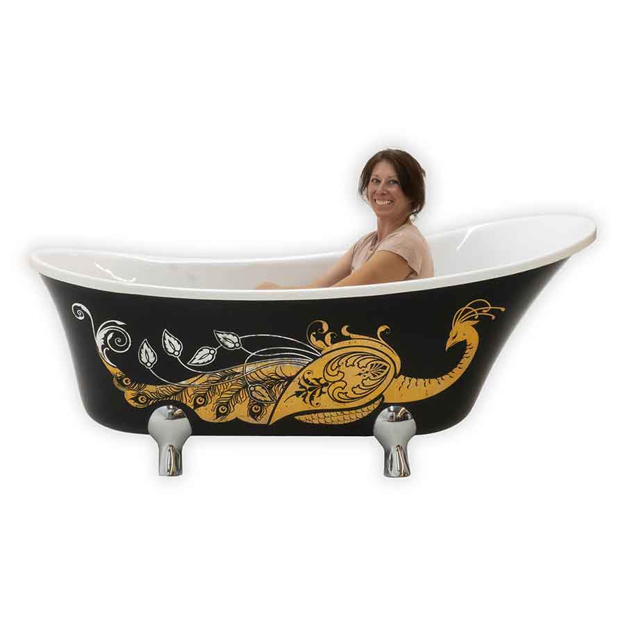 Woman sitting in a black bathtub with gold decorative elements on a white background